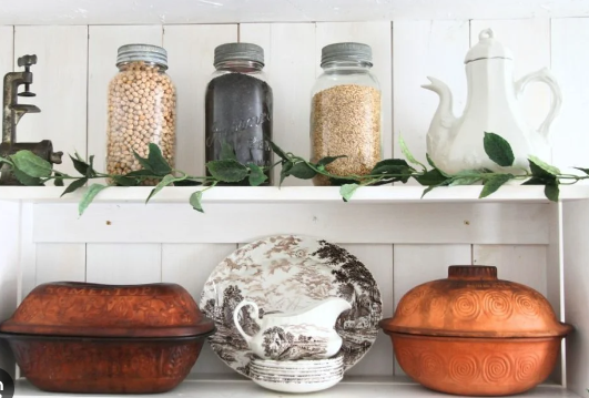 Farmhouse kitchen open shelving with glassware styling